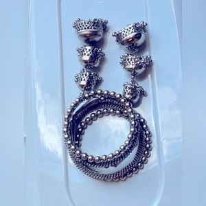 Hanging tassels bracelet in silver color